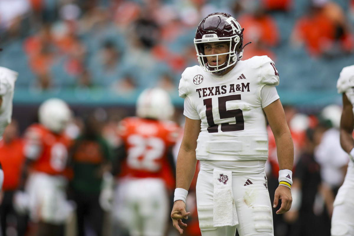 Sep 9, 2023; Miami Gardens, Florida, USA; Texas A&M Aggies quarterback Conner Weigman (15) looks on against the Miami Hurricanes during the first quarter at Hard Rock Stadium. Mandatory Credit: Sam Navarro-USA TODAY Sports